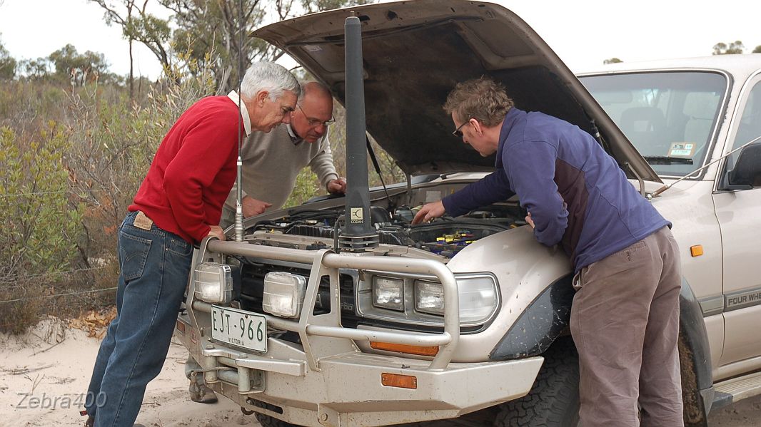 24-Big Mac checks out mysterious noises under his bonnet.JPG